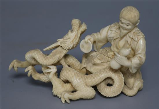 Japanese ivory group of a Sennin and dragon